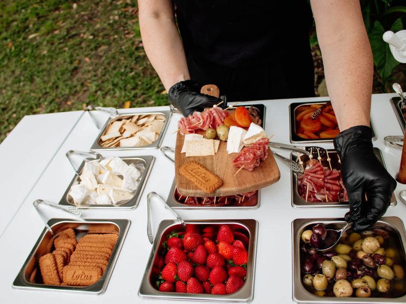 close-up of curated grazing board being styled
