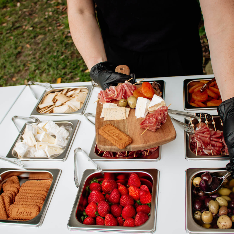 close-up of curated grazing board being styled